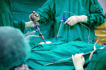 Surgeons team hands during laparoscopic abdominal operation in patient surgery in operating room