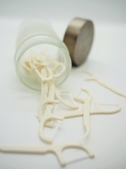 Tooth pick and Dental floss, all in one