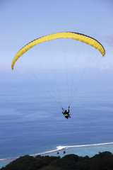 paragliding in the blue sky