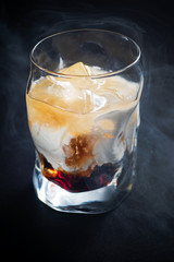 creative cocktail on the dark background