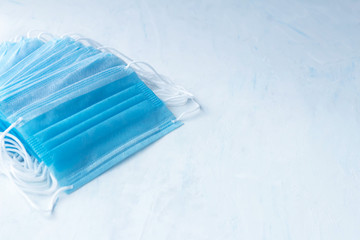 protective masks are on the table, protection during the coronavirus pandemic, free space on the right