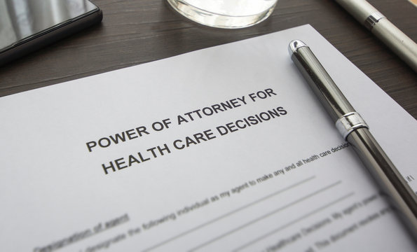 A Power Of Attorney On The Table. A Document On The Desk.  Power Of Attorney For Health Care.