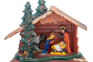 old Christmas plastic nativity scene decoration on white background