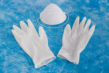 personal hygiene against virus outbreaks like covid-19, disposable gloves with face mask as essential items for health safety