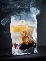 creative cocktail on the dark background