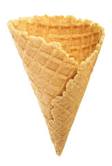 Empty ice cream cone isolated on white background. Sweet wafer cone. Vertical image.