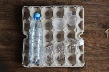 Plastic bottles in the paper box