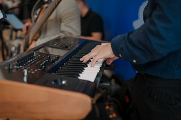 Hands playing a good piano popular music