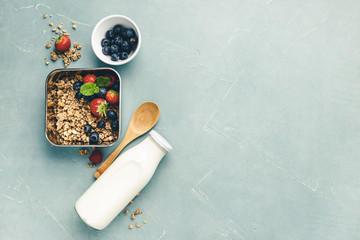 Metal container with ingredients for healthy breakfast