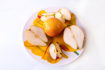 chopped fresh pear with apple on a plate