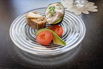 Vegetarian dish with tomato and avocado