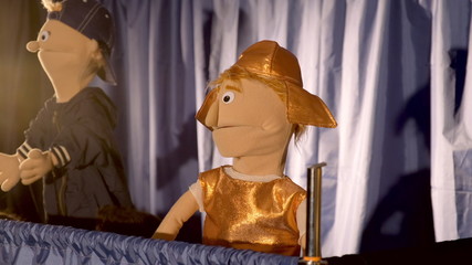 Puppet Roman soldier in action. In the background there is the other puppet character