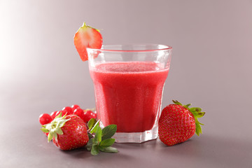 strawberry juice, smoothie and fresh raw berries