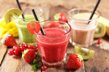 assorted of fruit smoothie and fresh fruits