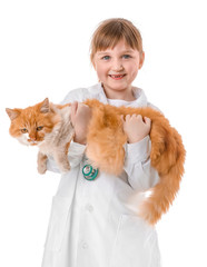 Little veterinarian with cute cat on white background