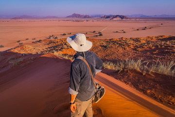 Looking at Sesriem at sunset from the top of the Elim dune in Namibia in Africa.
