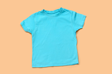 Stylish t-shirt on color background