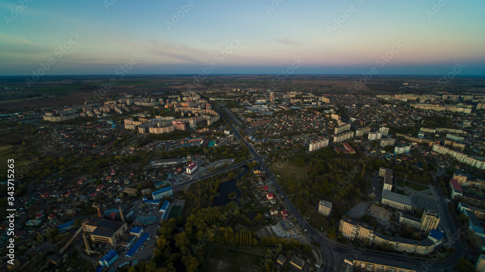 Wall mural aerial view of rivne city on sunset