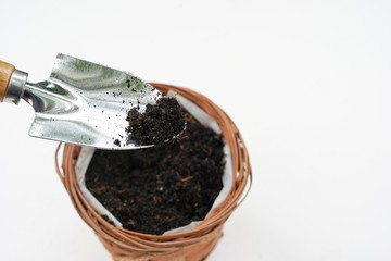 gardening tools and soil surface isolated on a white background