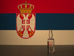 COVID 19 virus vaccine against the backdrop of the Serbia flag. Close-up.