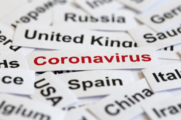 Obraz premium The Coronavirus Epidemic.The paper is written with the word coronavirus on paper that writes the names of different countries.The spread of the coronavirus to many countries around the world.
