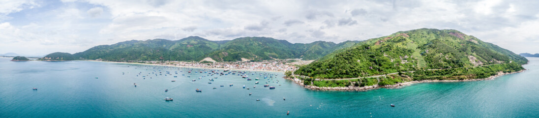 Panorama Aerial view of Dai Lanh beach, Van Ninh, Khanh Hoa. Situated at the south central coast of Vietnam,a two-kilometre bay with a fishing village at one end & a beach at the other © ZOOMATIONS