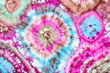 part of abstract bright ornament in tie-dye batik technique handpainted on silk head scarf