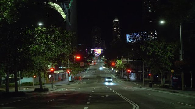 Only a few people traveling on the streets of Sydney due to the Corona Virus spread - wide shot