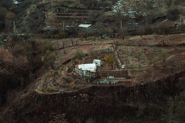 Beautiful village in a mountain valley near the lake. Mountains landscape and old town. Travel - Dagestan