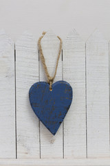 Blue Heart Hanging From Fence