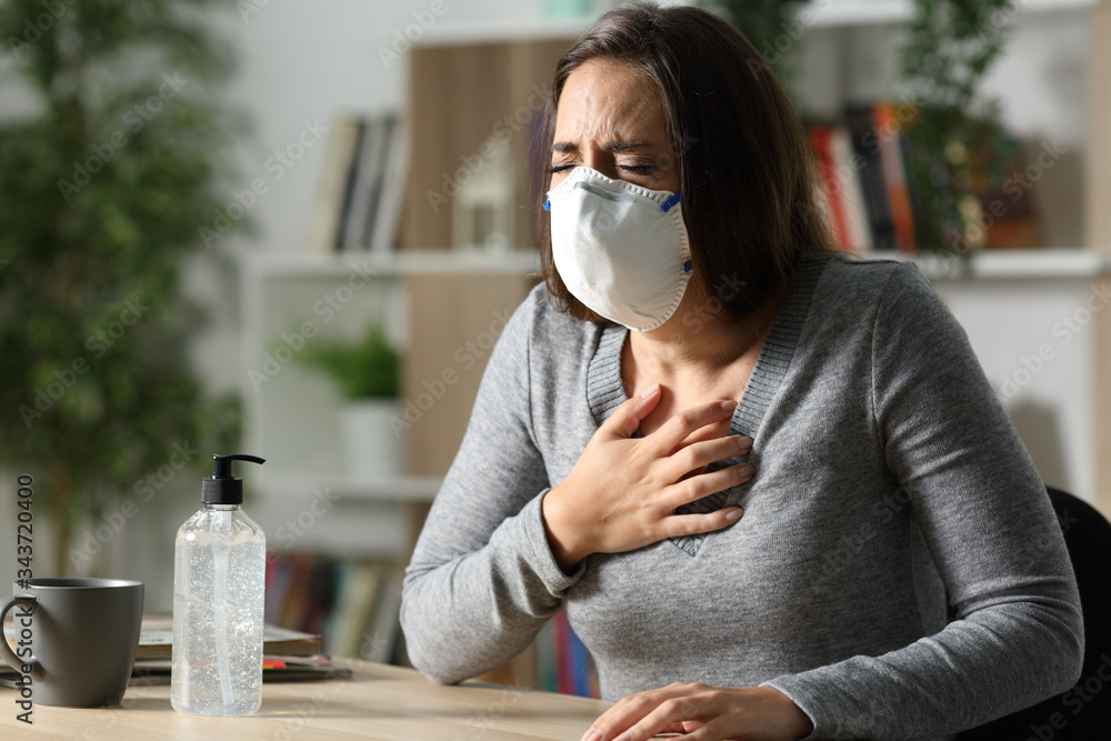 Wall mural Woman suffocating due coronavirus at nigh at home