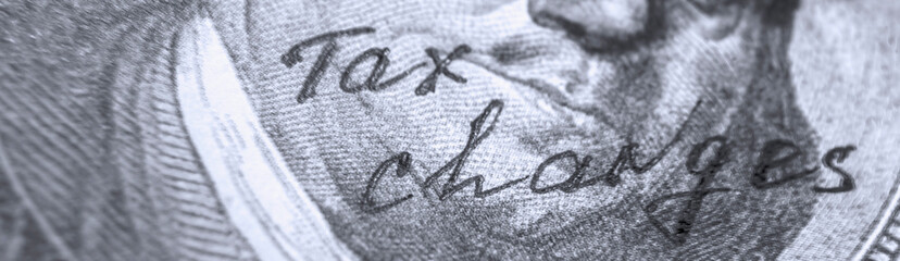 US Dollar banknote with inscription Tax Reform. Horizontal image.