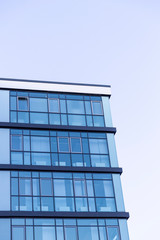 Fototapeta premium Facade of a Corporate Building during sunrise