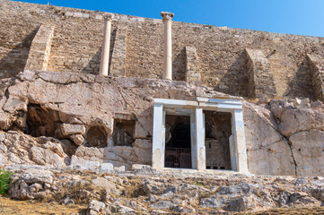 Fototapeta premium Main view of the entrance to the Trasilo Monument at the Acropolis archaeological site in Athens, Greece