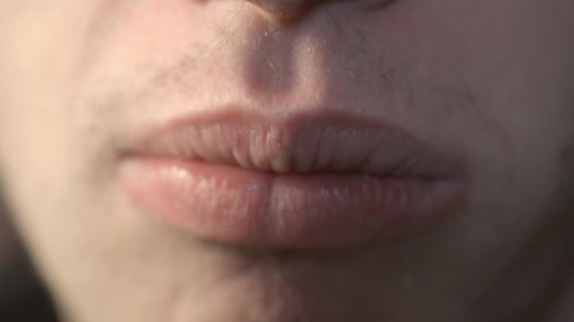 Guy Chewing And Popping Bubblegum - Extreme Closeup Shot