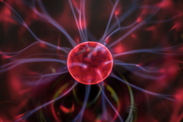 Abstract image of chaotically moving blue lightnings around an  circle.  Cosmic abstraction of the birth of a new planet. Technological background. No focus.