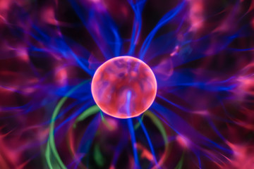 No focus. Technological background. An abstract image of chaotically moving blue lightnings around a circle. Cosmic abstraction of the birth of a new planet.