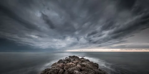 Foto auf Alu-Dibond Approaching storm on the sea at sunset © Gian Marco Bianchi 