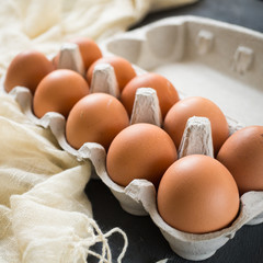 Fresh brown chicken eggs in a packing cassette