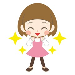 顔の前で両手を握る女の子