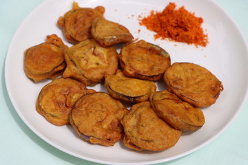 Brinjal Pakoda or Pakora, egg plant fritters, Indian food