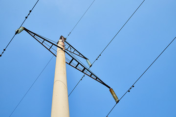 Electric power lines and wires with blue sky. Support of power lines in a nice day