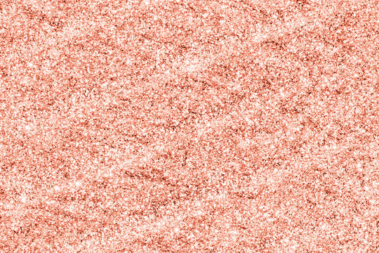 Trendy pastel background in rose gold. Glittering sequins glamour gloss