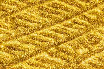 Trendy pastel background in gold. Glittering sequins glamour gloss