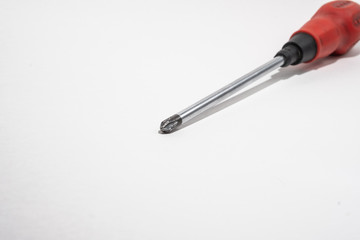 Old figure screwdrivers on white background