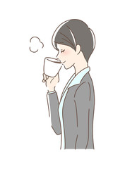 マグカップのコーヒーを飲む女性の横顔