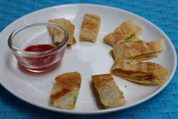 Cheese dosa served as bites,  South Indian food