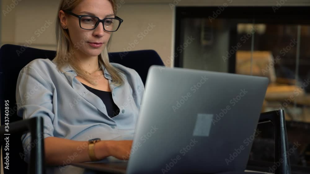 Aufkleber caucasian female remote worker sharing media files via bluetooth connection on digital tablet and la