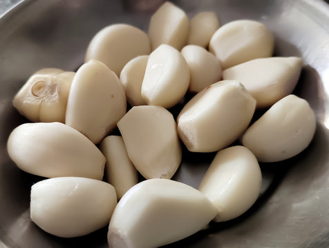 Garlic (Allium sativum), is used widely as a flavoring in cooking, but it has also been used as a medicine throughout ancient and modern history.