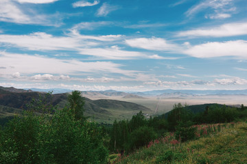 Fototapeta premium Mountains hill landscape with blue sky and clouds.